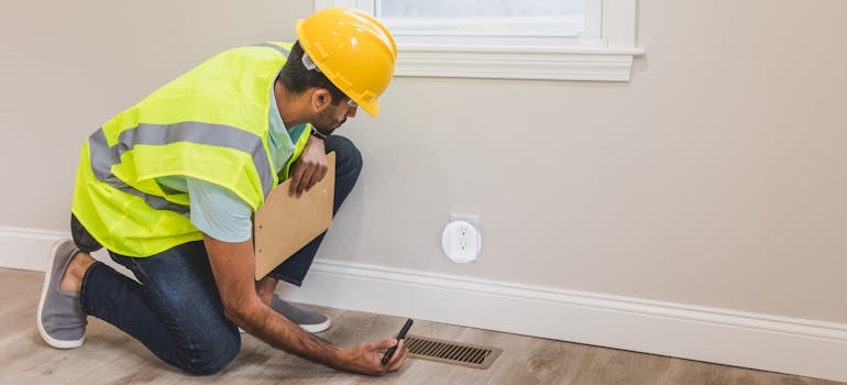 A home inspector checking a house