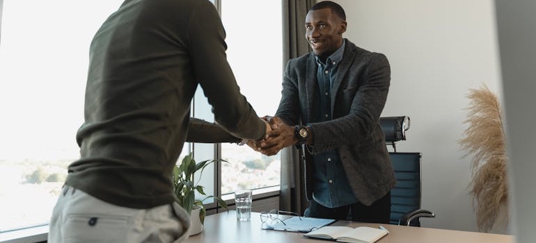 A job candidate in an interview discussing a relocation package