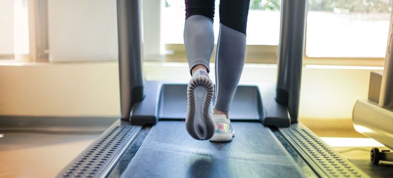a person running and wondering how to pack a home gym for a move
