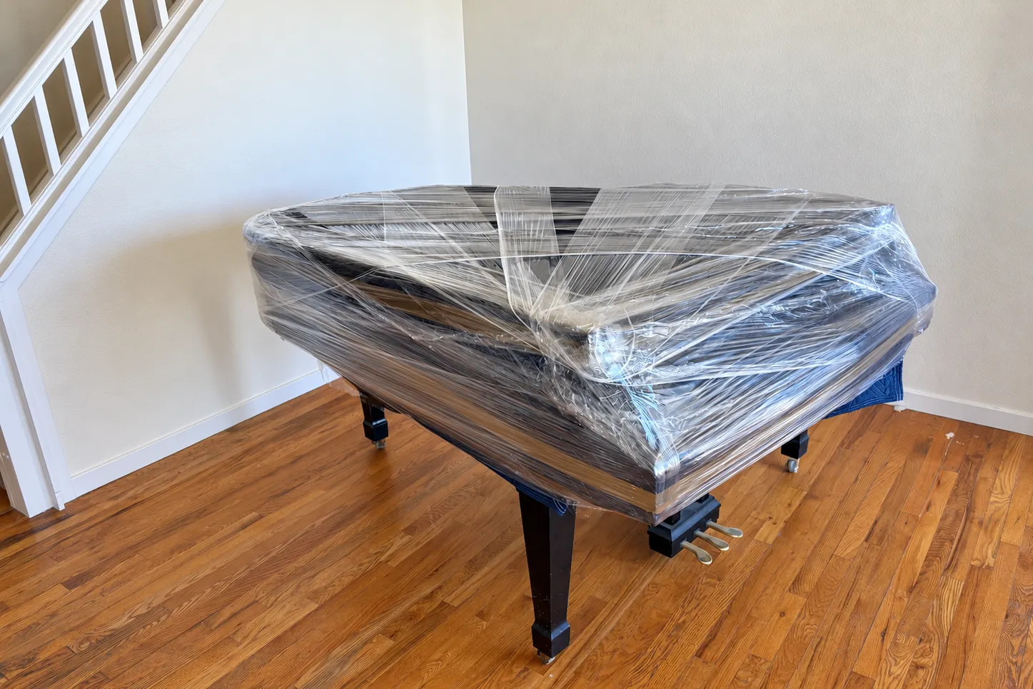 Grand piano shrink-wrapped by Spyder movers serving Vicksburg, MS