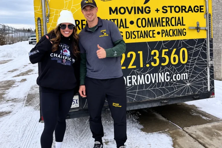 Spyder mover with a customer next to the truck on a snowy day