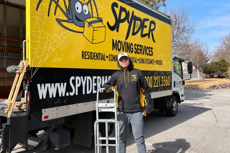 Spyder mover with a hand truck beside the Spyder truck