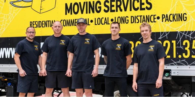 Spyder Moving and Storage crew in front of a Spyder truck
