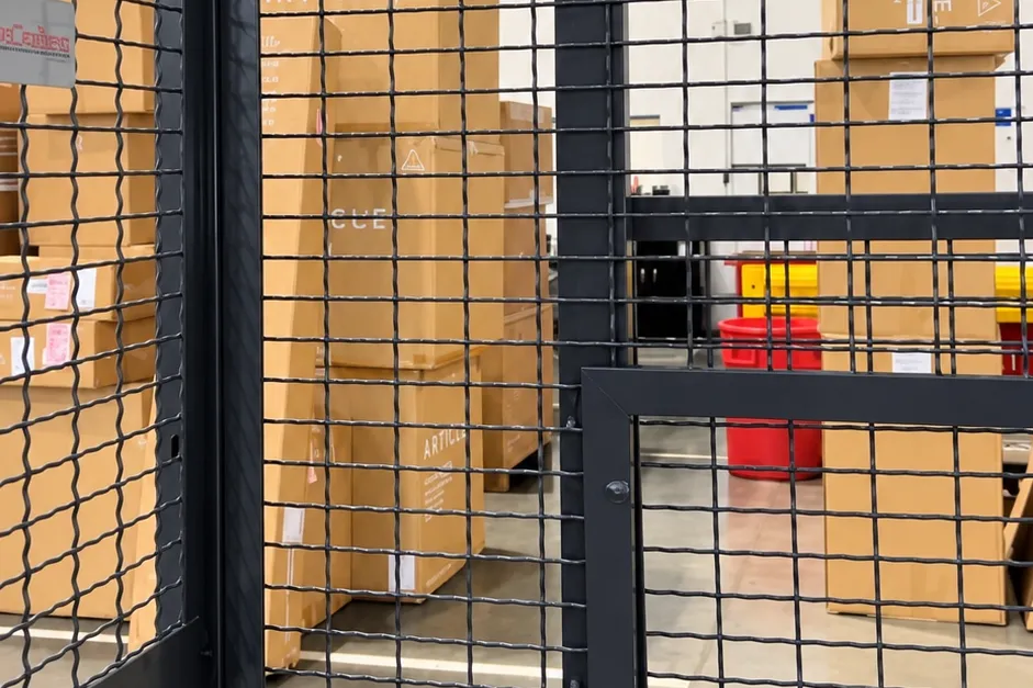 Boxes in a secure Spyder storage cage