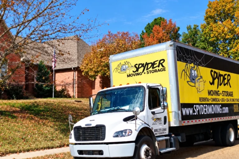 Spyder truck parked among autumn trees