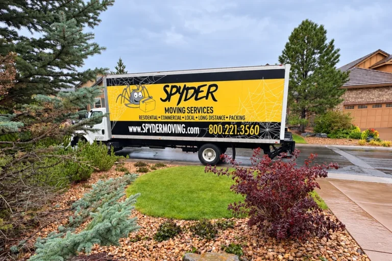 Spyder truck parked beyond a landscaped front yard