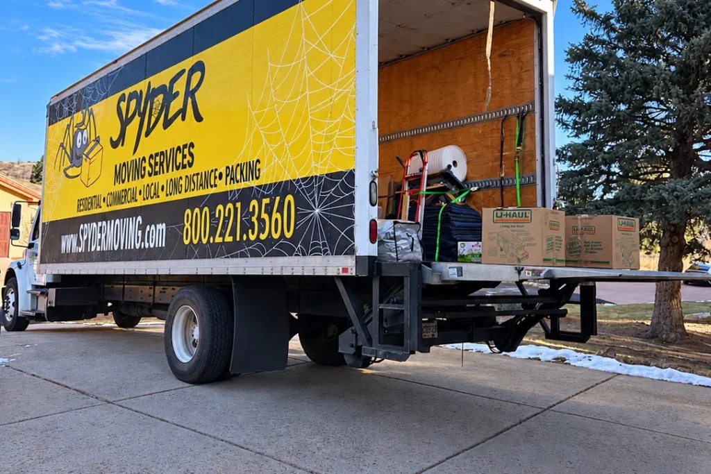 Open Spyder truck parked on a residential street