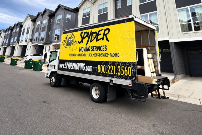 Spyder truck parked along a row of townhomes